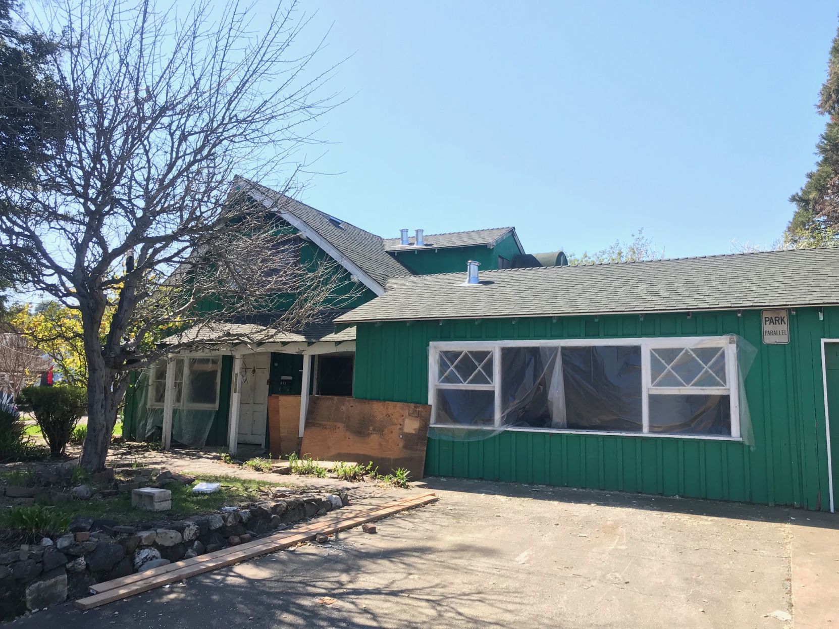 The outside of a former Napa hoarder house after 50,000 lbs. of garbage was removed